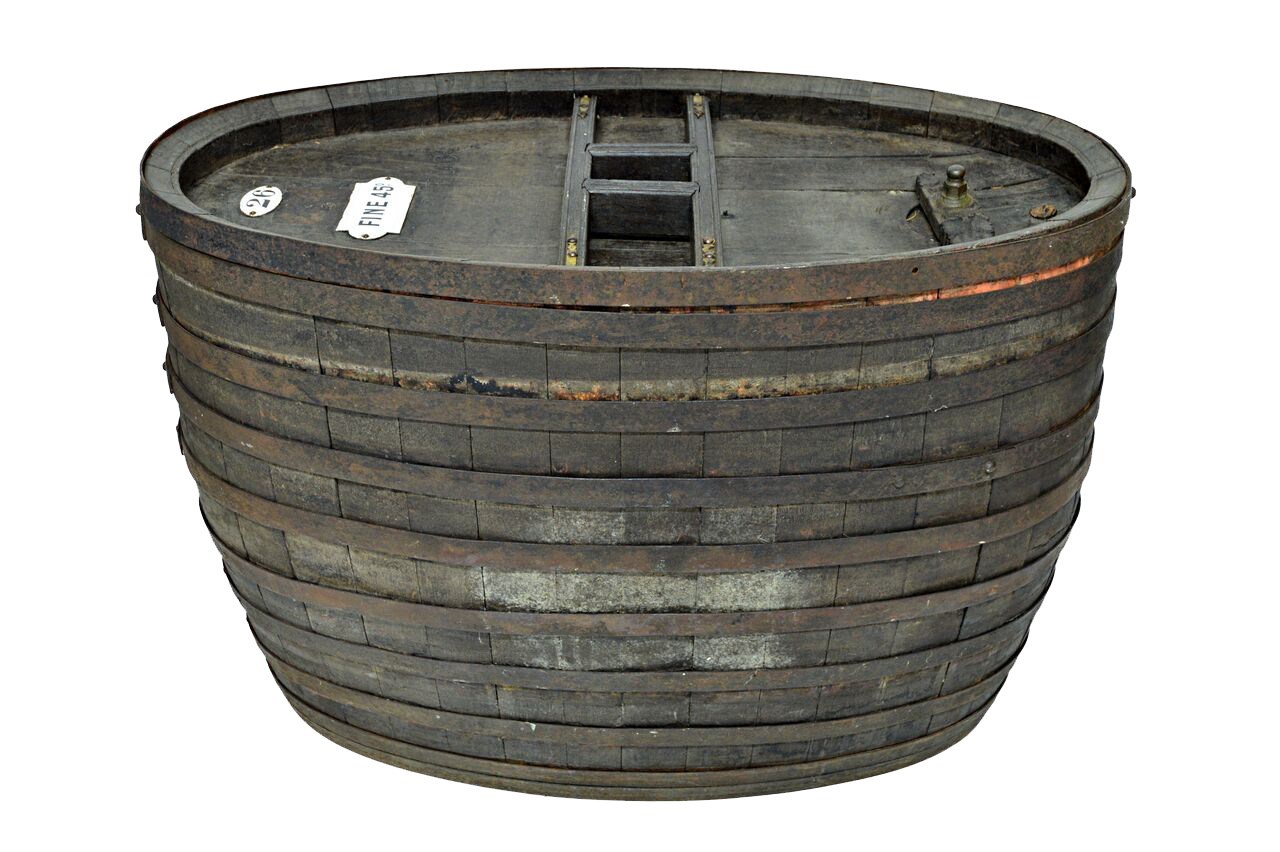 Appraisal: A large th century coopered oak wine barrel of compressed