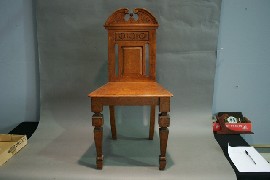 Appraisal: A single oak hall chair with cushion