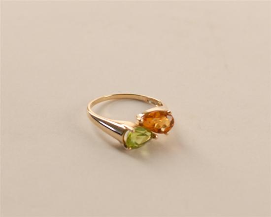 Appraisal: A Gold Peridot and Citrine Ring K marked yellow gold