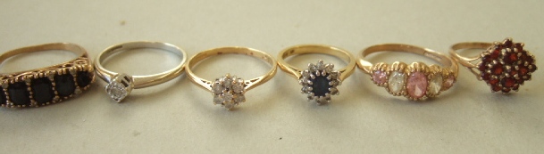 Appraisal: An ct gold sapphire and diamond set oval cluster ring