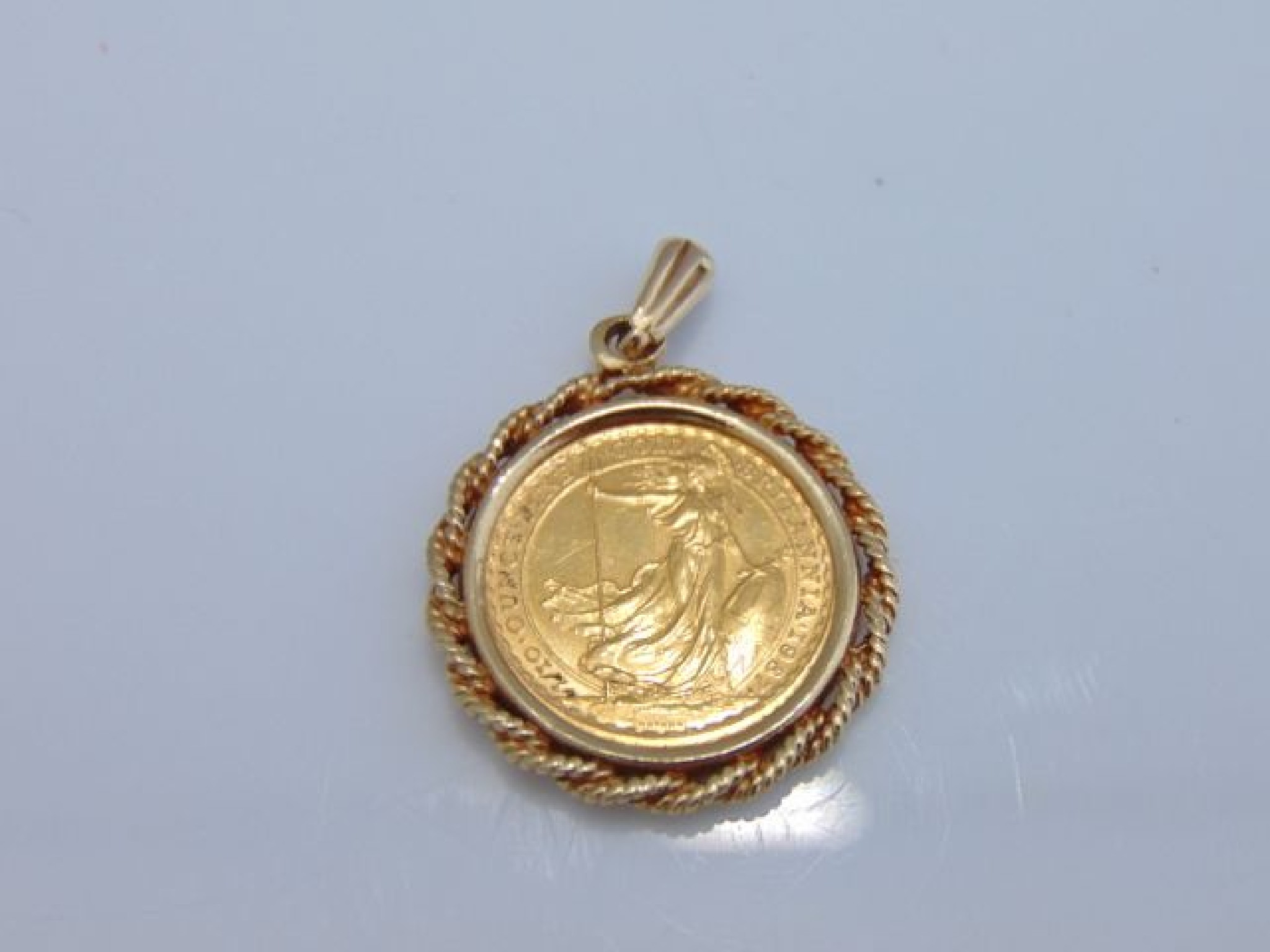 Appraisal: A Oz Britannia coin pendant with ct gold rope-twist border