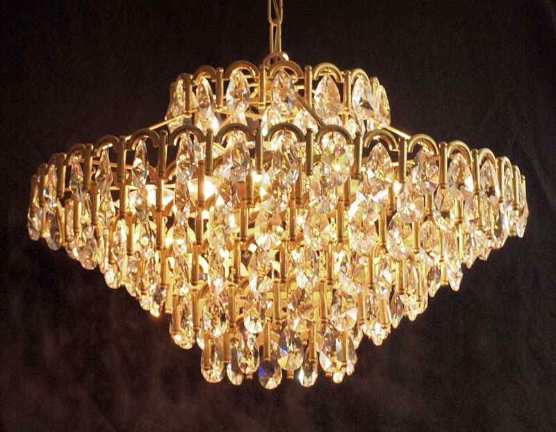 Appraisal: TIER CRYSTAL CHANDELIER Ten light chandelier of high quality tear