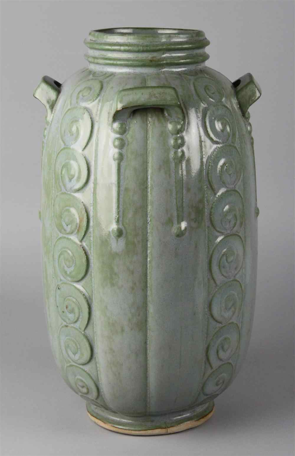 Appraisal: STUDIO POTTERY CARVED AND MOLDED LUG-HANDLED VASE impressed under base