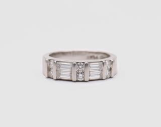 Appraisal: Platinum and Diamond Ring PLATINUM AND DIAMOND RINGfeaturing full-cut and