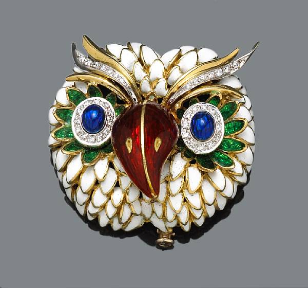 Appraisal: A diamond and enamel brooch in the form of an