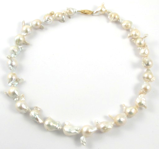 Appraisal: PEARL AND FOURTEEN KARAT GOLD NECKLACE in length and strung