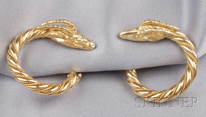 Appraisal: kt Gold Earclips Greece each hoop with ram's head terminal