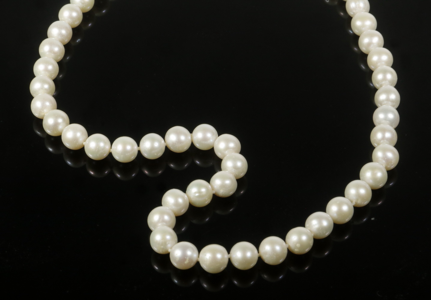 Appraisal: PEARL NECKLACE Strand of to - mm pearls with K