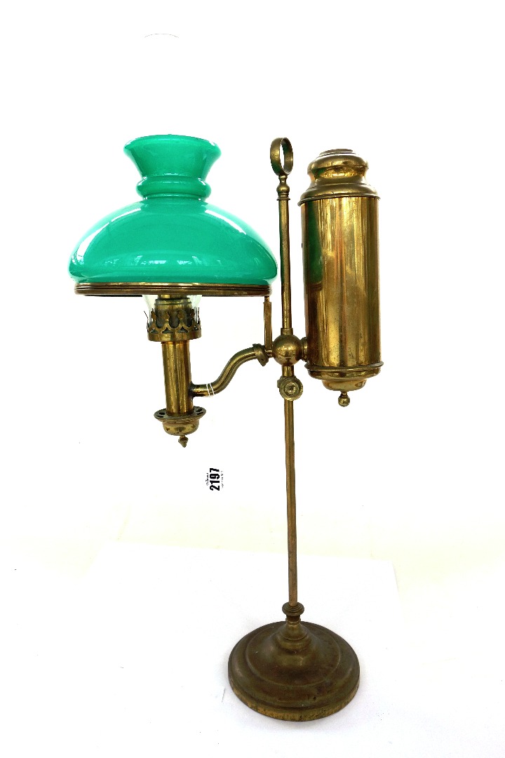 Appraisal: A brass adjustable oil lamp early th century with green