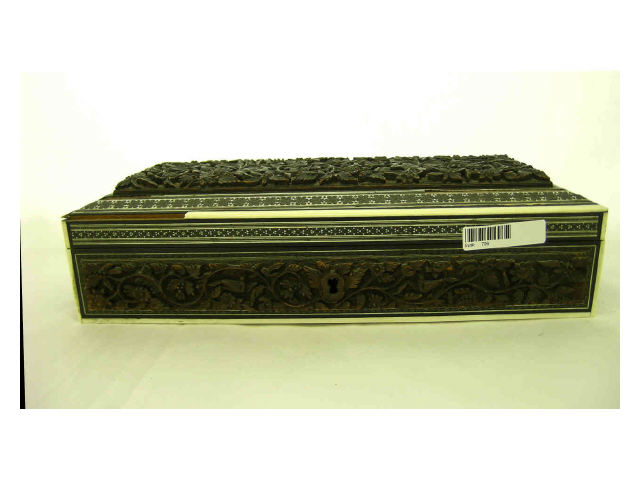 Appraisal: Intricately carved wooden glove box with ivory trim missing some