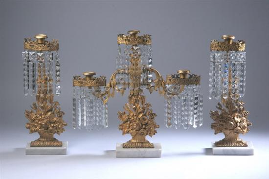 Appraisal: THREE-PIECE AMERICAN VICTORIAN GILT BRASS AND CRYSTAL LUSTRE GARNITURE circa