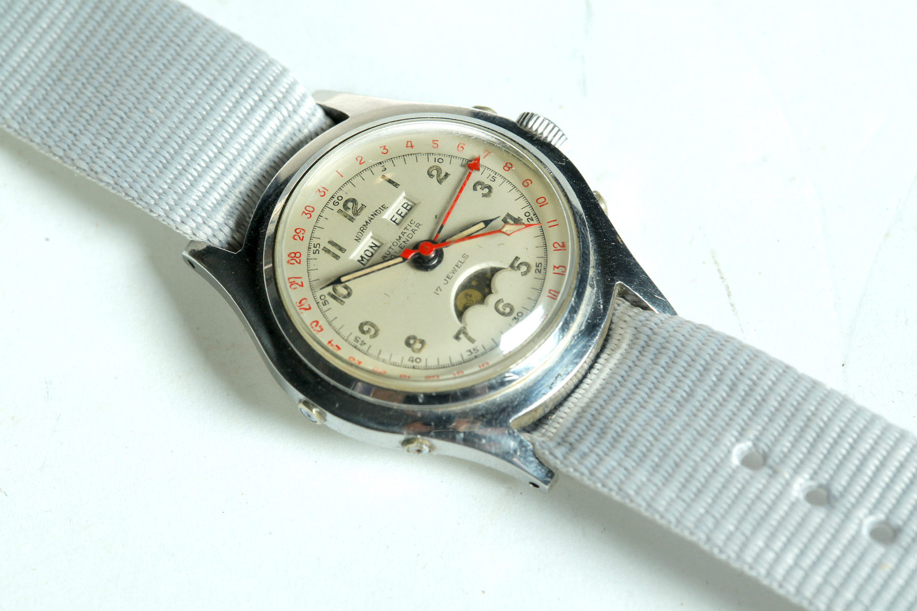 Appraisal: NORMANDIE WWII AUTOMATIC CALENDAR WATCH France ca Stainless steel waterproof