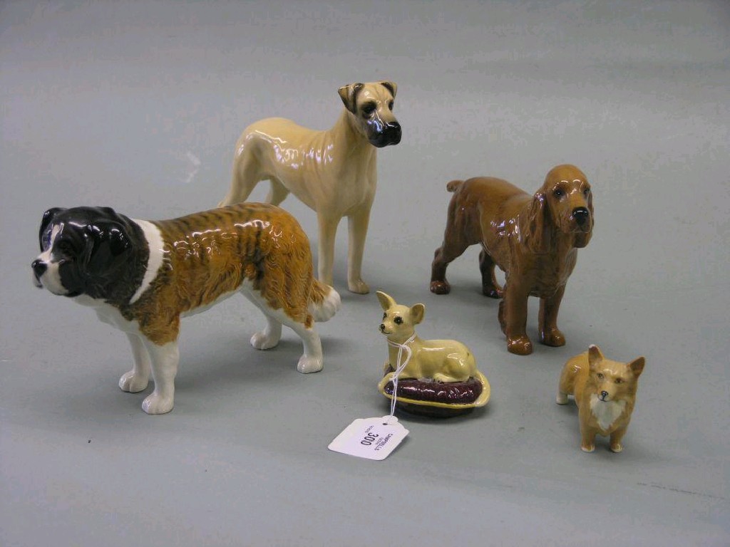 Appraisal: Five Beswick dogs Great Dane Cocker Spaniel small Corgi right