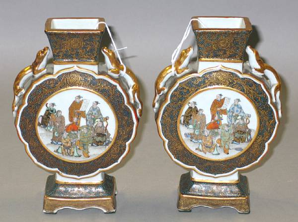 Appraisal: A pair of Kutani porcelain vases Meiji Taisho Period Of