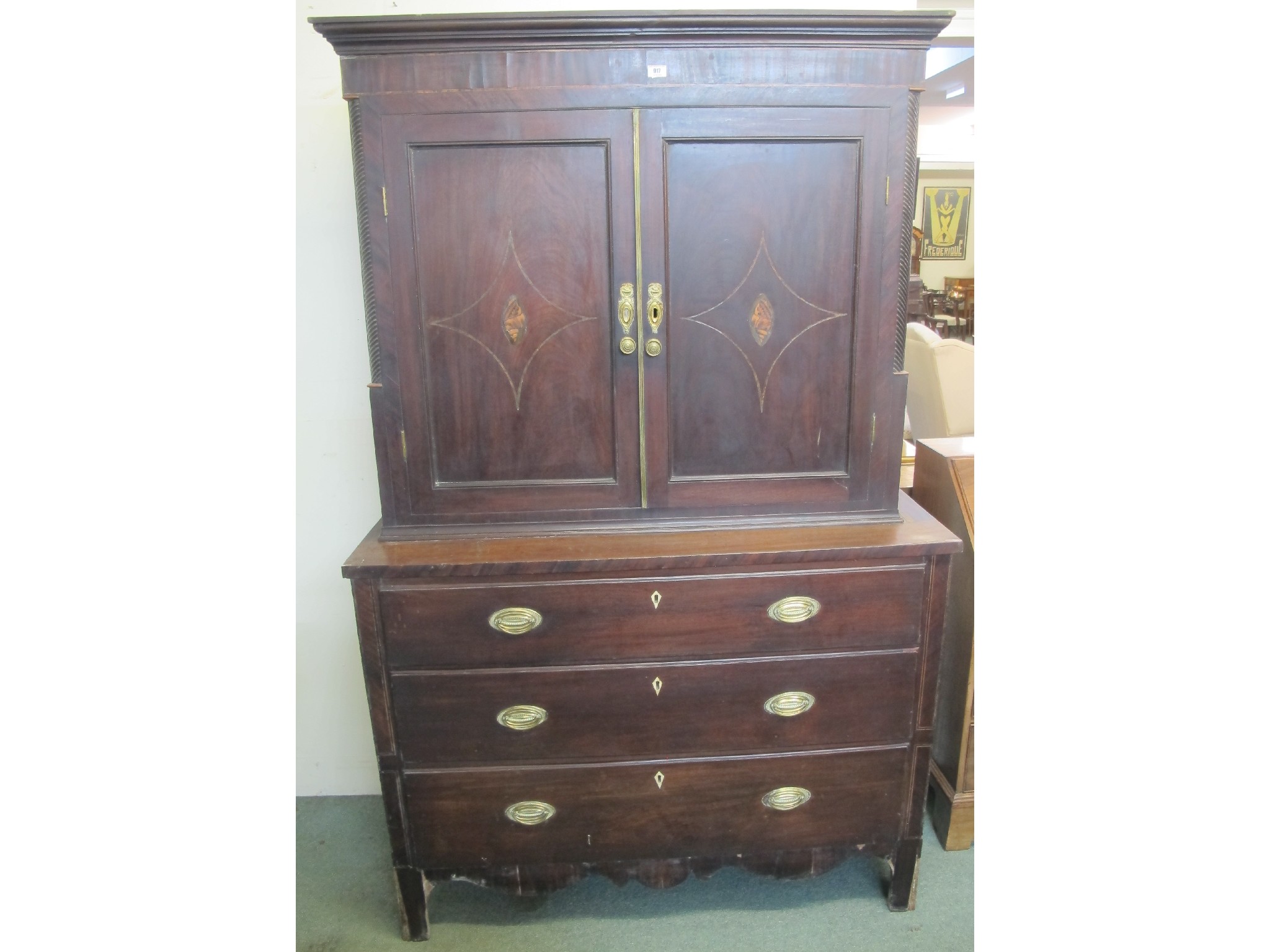 Appraisal: A George IV mahogany cabinet on three drawer chest