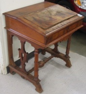 Appraisal: A VICTORIAN SLANT-TOP WALNUT WRITING DESK American last quarter of