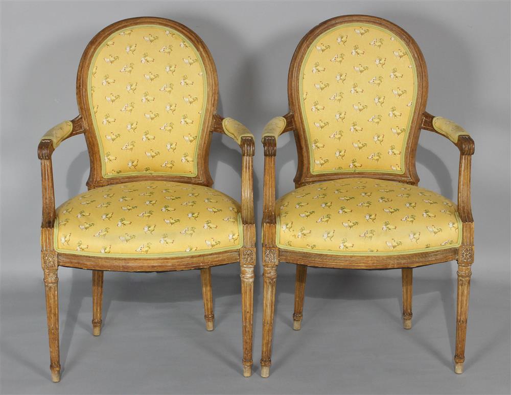 Appraisal: PAIR OF LOUIS XVI STYLE OPEN ARM CHAIRS each with