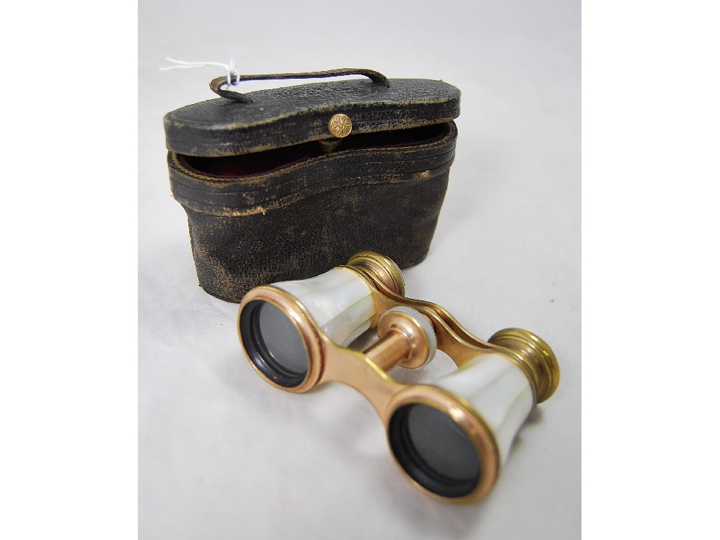 Appraisal: A pair of Victorian gilt metal and mother-of-pearl opera glasses