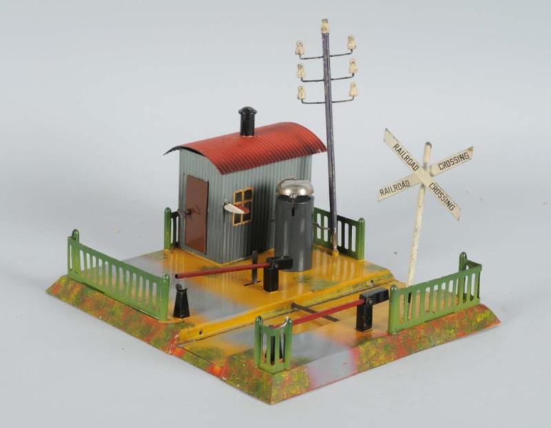 Appraisal: Fandor Railroad Crossing Island Description Circa s Vibrant hand-painted colors