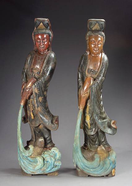 Appraisal: A group of three wood figural sculptures Including two painted