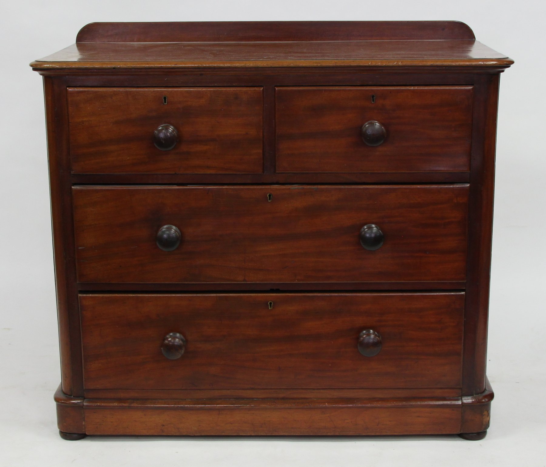 Appraisal: A Victorian mahogany chest of two short over two long