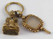 Appraisal: An antique carat gold cased fob seal and watch key