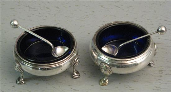 Appraisal: Victorian silver round salts with blue glass liners diameter London