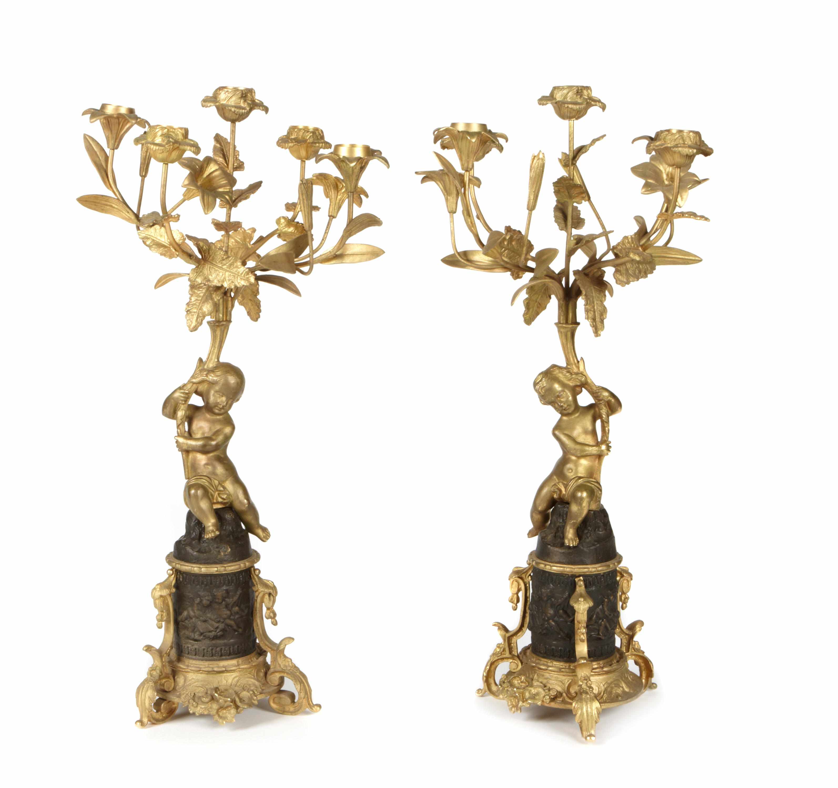 Appraisal: A pair of Louis XV style gilt and patinated bronze