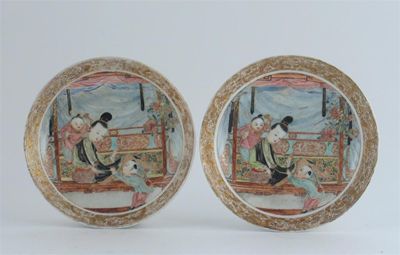 Appraisal: A pair of Chinese famille rose saucers delicately painted with