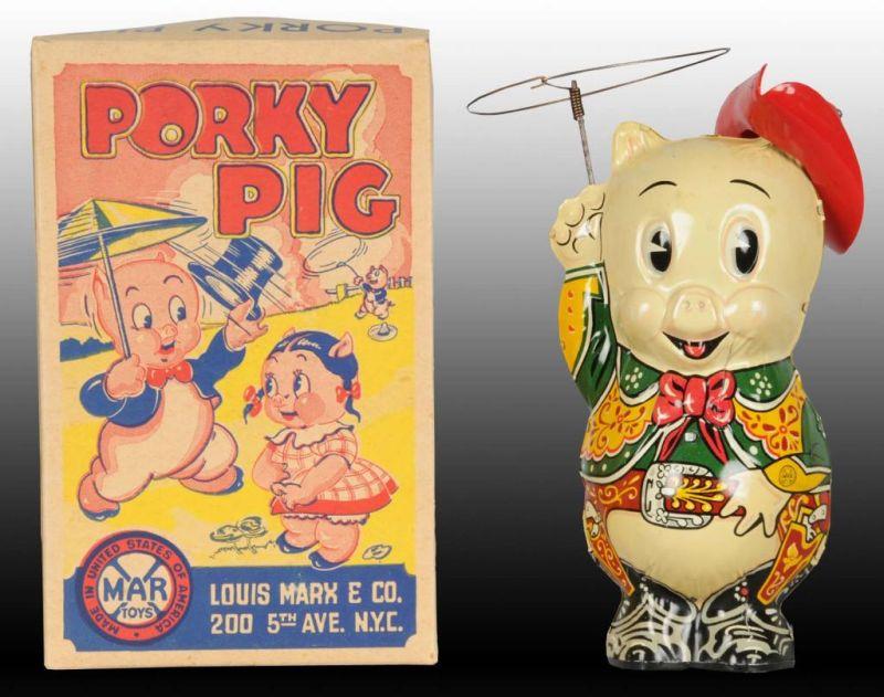 Appraisal: Marx Tin Wind-Up Porky Pig Cow Puncher Toy Description Includes