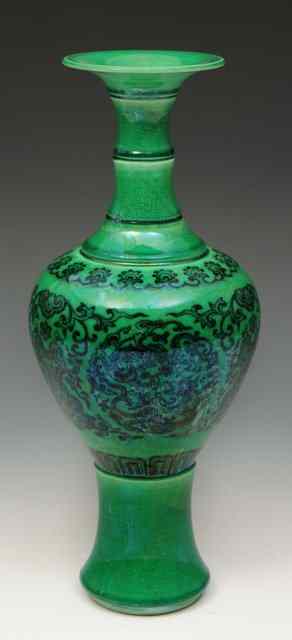 Appraisal: A CHINESE GREEN SLENDER PORCELAIN VASE with monochrome arabesque designs