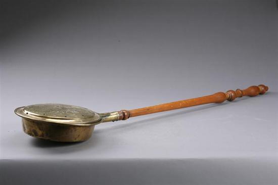 Appraisal: BED WARMER American th century Brass pan with engraved lid