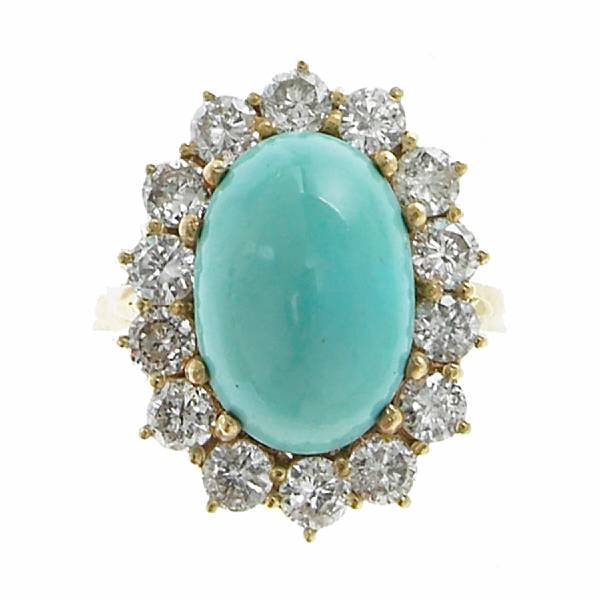 Appraisal: A turquoise diamond and k gold ring oval cabochon turquoise