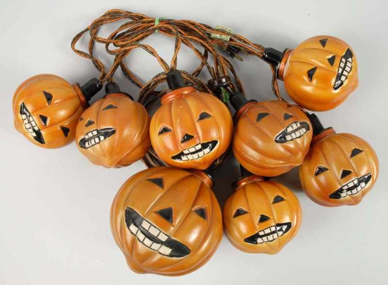 Appraisal: String of Halloween Pumpkin Lanterns Description All lanterns light-up except