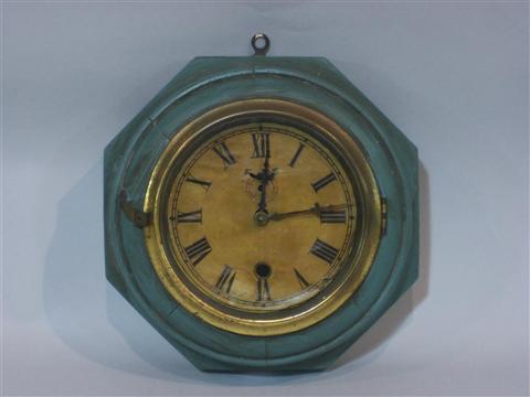 Appraisal: OCTAGONAL CASED WALL CLOCK The circular paper clock face enclosed