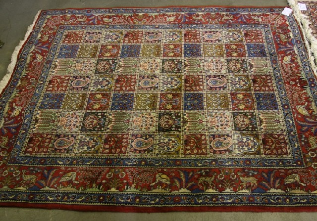 Appraisal: A Qum style wool carpet the border featuring birds and