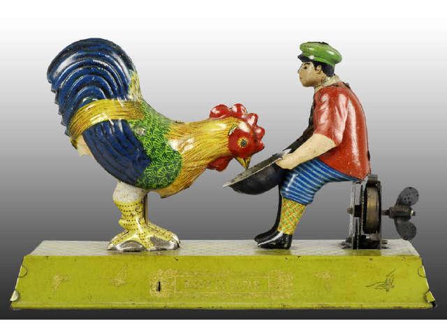 Appraisal: Tin Japanese Boy Feeding Chicken Toy Description Pre-war Wind-up Working