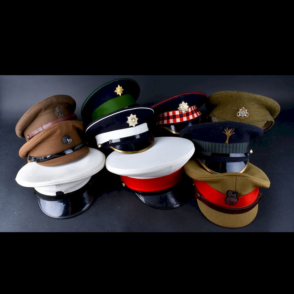 Appraisal: Ten Military Hats Ten European Military Hats Size ranges from