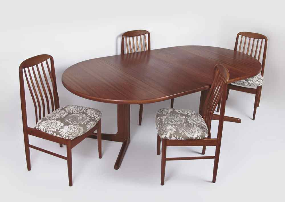 Appraisal: DANISH MODERN TEAK DINING TABLE AND CHAIRS Scovby and Danish