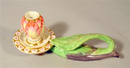 Appraisal: English porcelain chamber stick late th century The tulip-form candle