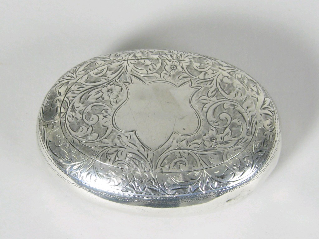 Appraisal: A George V oval Snuff Box with leafage scroll engraving