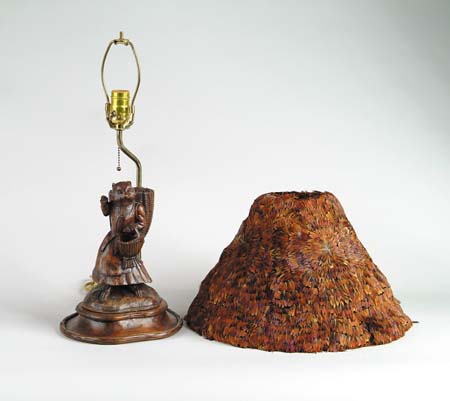 Appraisal: BLACK FOREST TYPE CARVED LAMP WITH FEATHER SHADE Carved wood