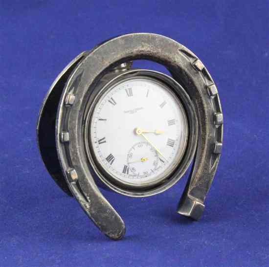 Appraisal: A Victorian silver horseshoe shaped watch holder Thornhill Co London