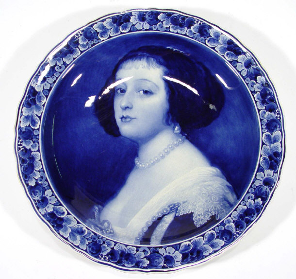 Appraisal: Delft pottery charger decorated with a portrait of a young