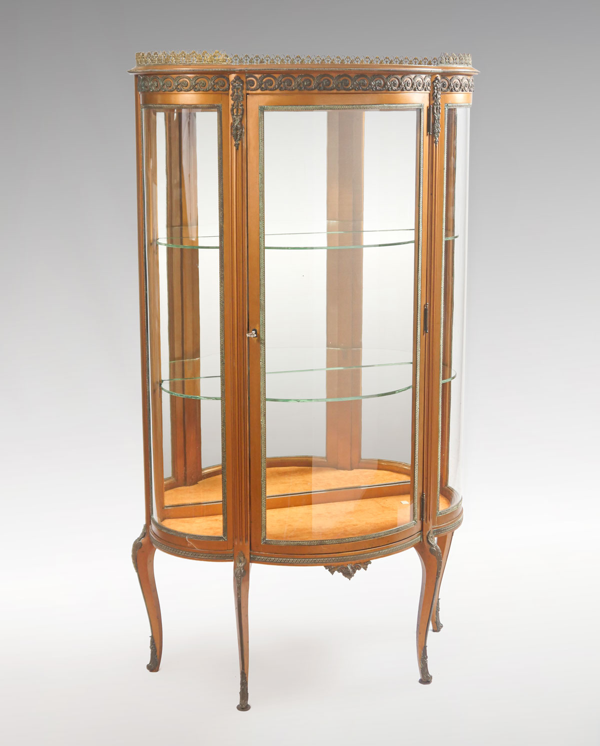 Appraisal: BOW FRONT VITRINE DISPLAY CABINET Gallery top bow front vitrine