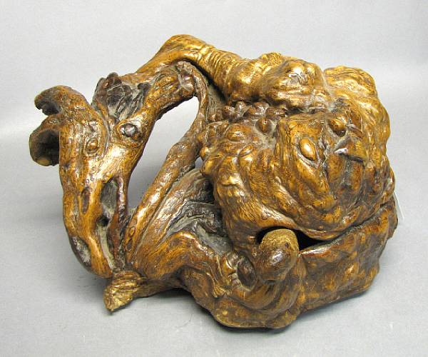 Appraisal: A root carving of a Muyu wooden fish Late Qing