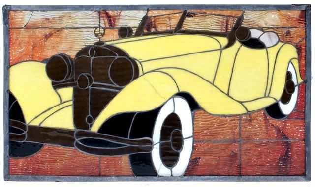 Appraisal: A STAINED GLASS PANEL depicting a classic Mercedes