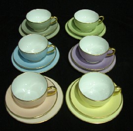 Appraisal: A set of six Limoges harlequin cafe au lait cups