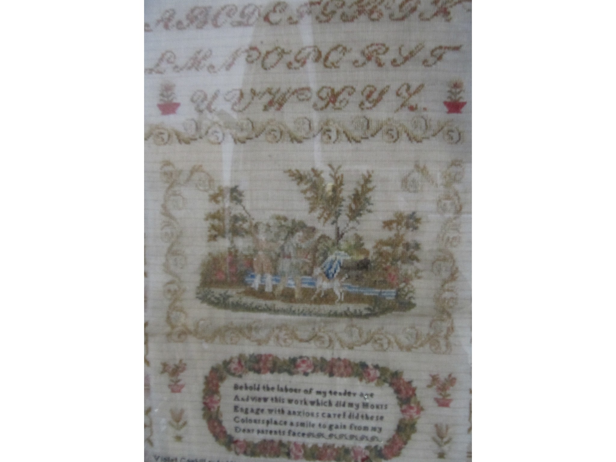 Appraisal: A framed sampler Violet Coghill