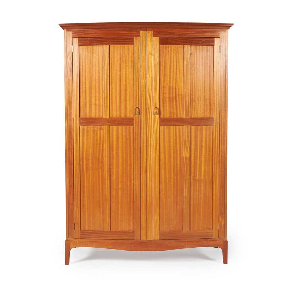 Appraisal: EDWARD BARNSLEY - PAIR OF BOW-FRONT WARDROBES CIRCA sapele and